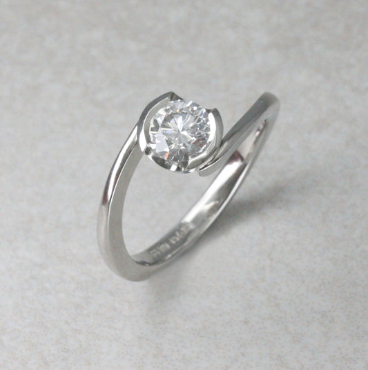 Platinum and Diamond “Twist” Solitaire Ring