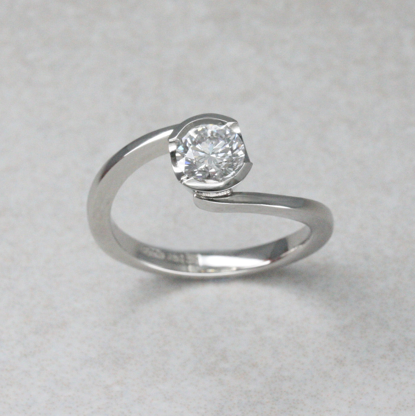Platinum and Diamond “Twist” Solitaire Ring