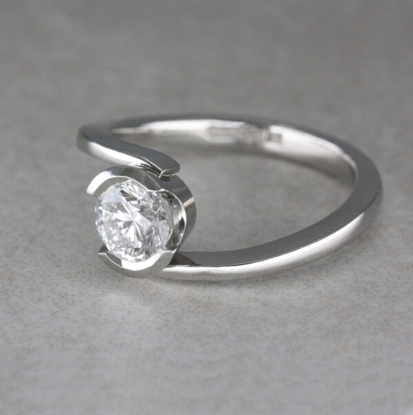 Platinum and Diamond “Twist” Solitaire Ring