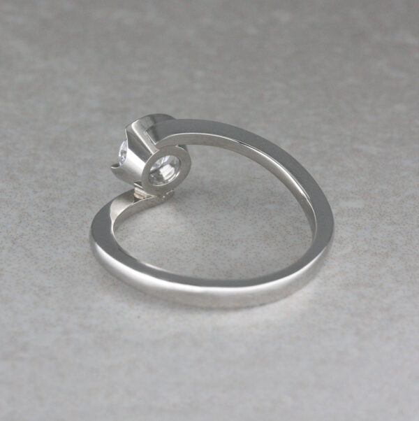 Platinum and Diamond “Twist” Solitaire Ring