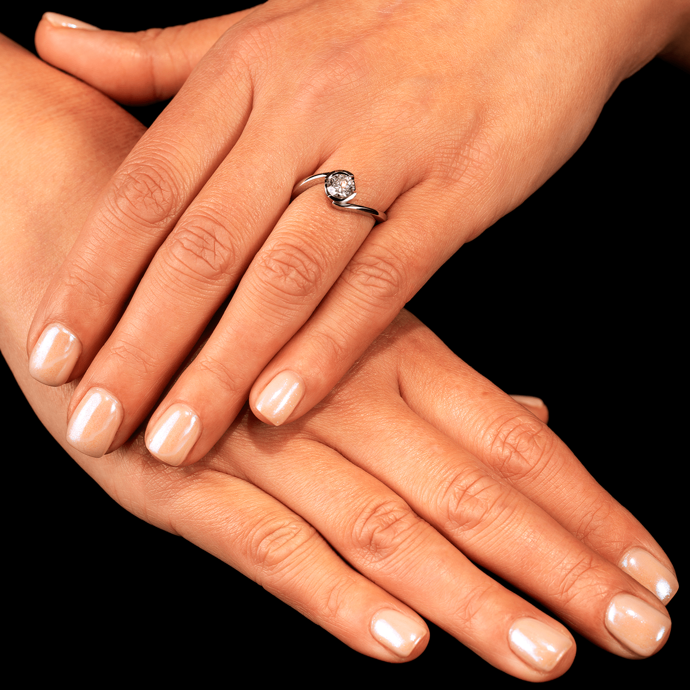 Platinum and Diamond “Twist” Solitaire Ring