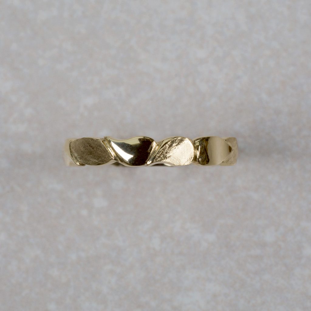 18 Carat gold Band with Hand Carved leaves